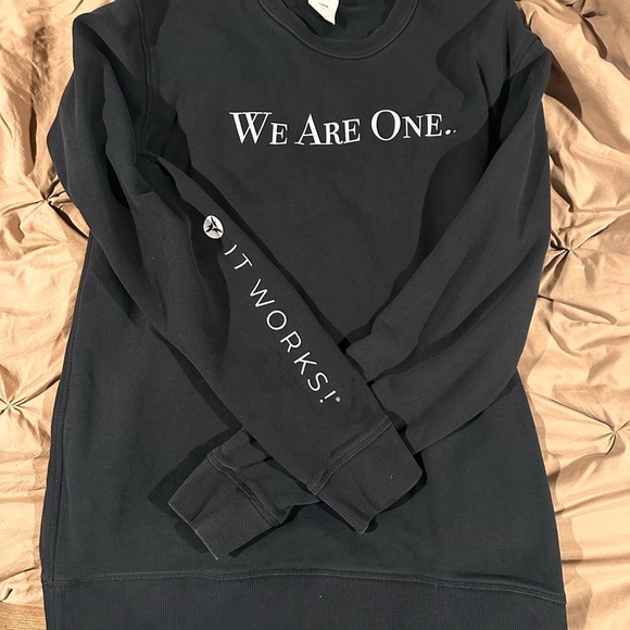 It Works! Tops - Black ‘It Works! WE ARE ONE’ Sweatshirt.